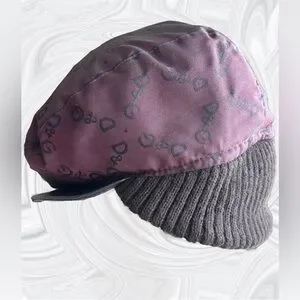 Vintage D&G Newsboy Cap
Made in Italy
Like New il_fullxfull.3330398208_62tv.jpg main image 4